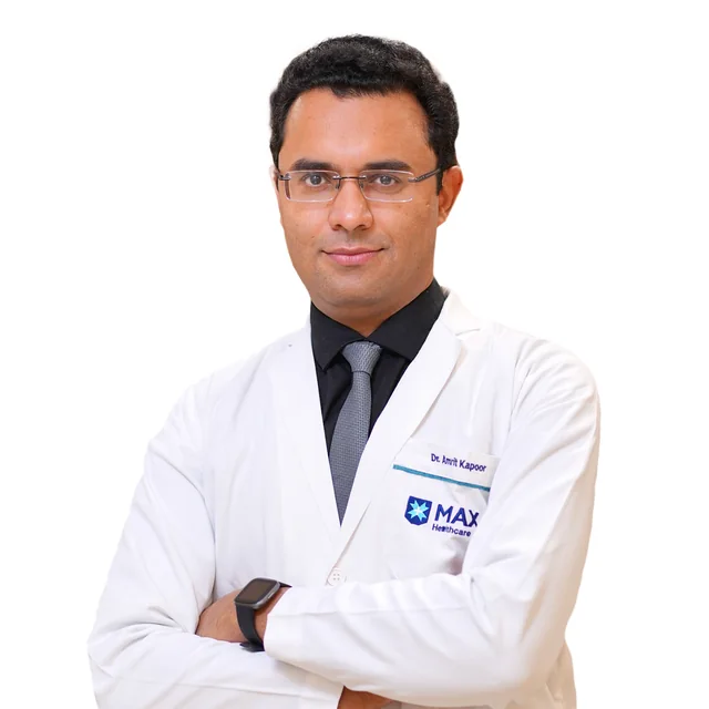 Dr. Amrit Kapoor