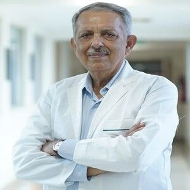 Dr. Arvind Taneja