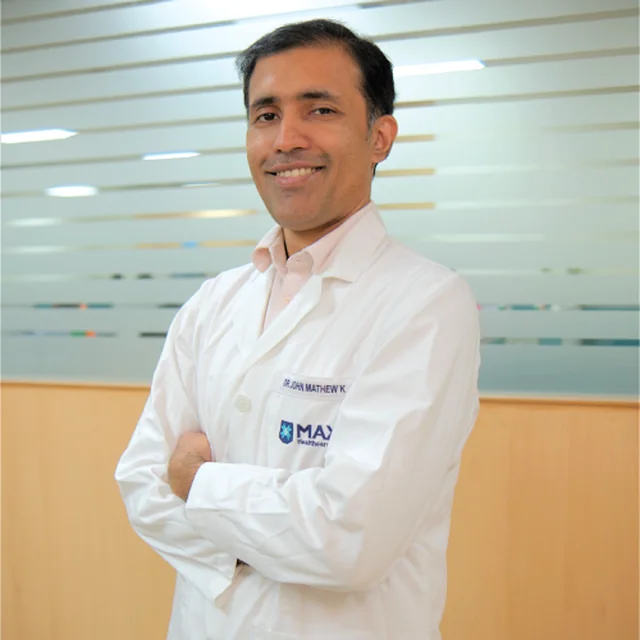 Dr. John Mathew K