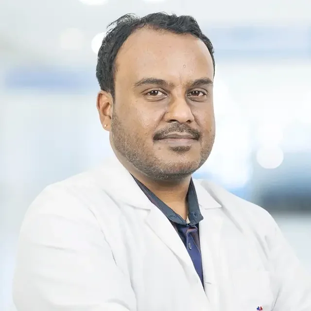 Dr. Ganesh B