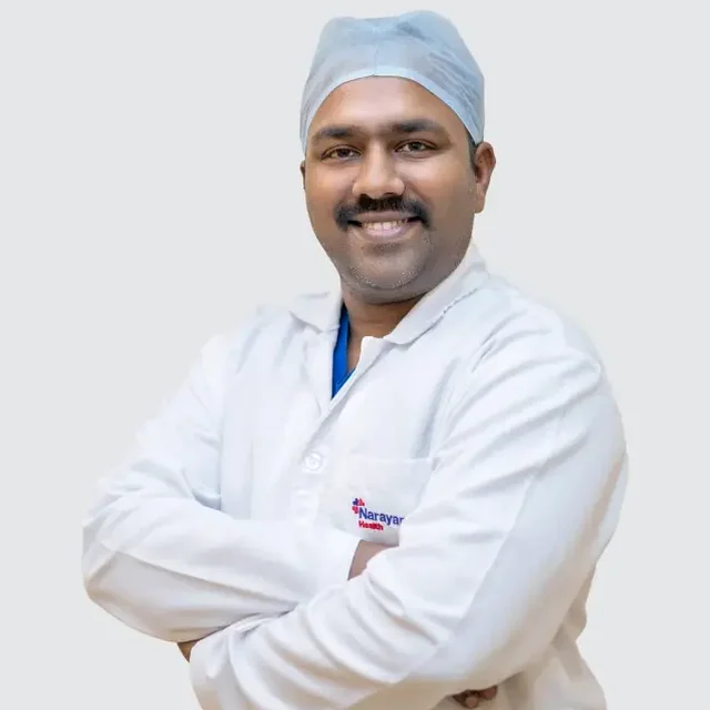 Dr. MANU P THOMAS